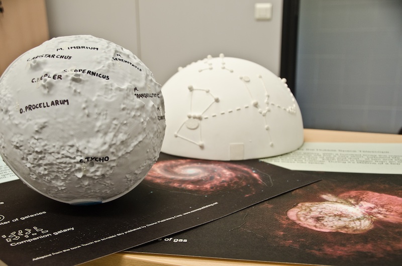 Astronomy for Equity. Tactile globes the size of a basketball teach astronomy to students and adults with blindness or vision impairment.